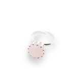 The "Silver Ring I'M A Queen with Rose Quartz - Size S" by Kaora Sandara Jewelry features a round pale pink rose quartz in a claw setting, crafted in sterling silver with an adjustable band and shown on a white background.