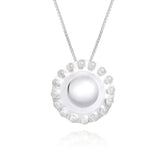 The Kaora Sandara Jewelry Silver Pendant Energy Transformer with Crystal is a sterling silver 925 necklace featuring a round pendant with a central pearl, surrounded by smaller pearls and rhinestone accents, hanging from a thin chain.
