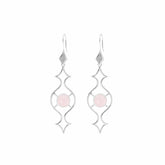 The Quantum Shift NEW Earhooks by Kaora Sandara Jewelry are sterling silver dangle earrings with an open geometric design, each featuring a round rose quartz stone at the center. Size L.