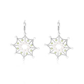 Experience the elegance of Kaora Sandara Jewelry’s Freedom from the Ego Earhooks—sterling silver dangle earrings with crystal, rose quartz, and peridot, featuring intricate wirework and secure hooks.