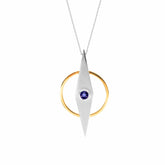 The Intuition Pendant by Kaora Sandara Jewelry features a sterling silver and gold-plated elongated diamond design with a central blue amethyst, elegantly suspended from a fine silver chain.
