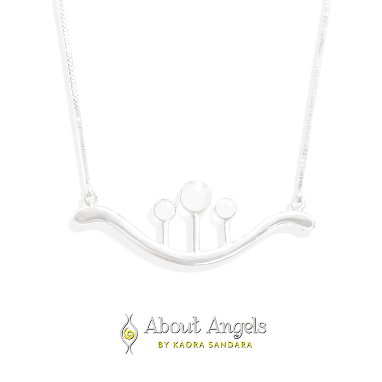 A Silver Pendant Beyond Fears on a thin square 45cm chain with crystal from Kaora Sandara Jewelry, featuring four circular shapes on a curved pendant, displayed above the "About Angels by Kaora Sandara" logo on white.