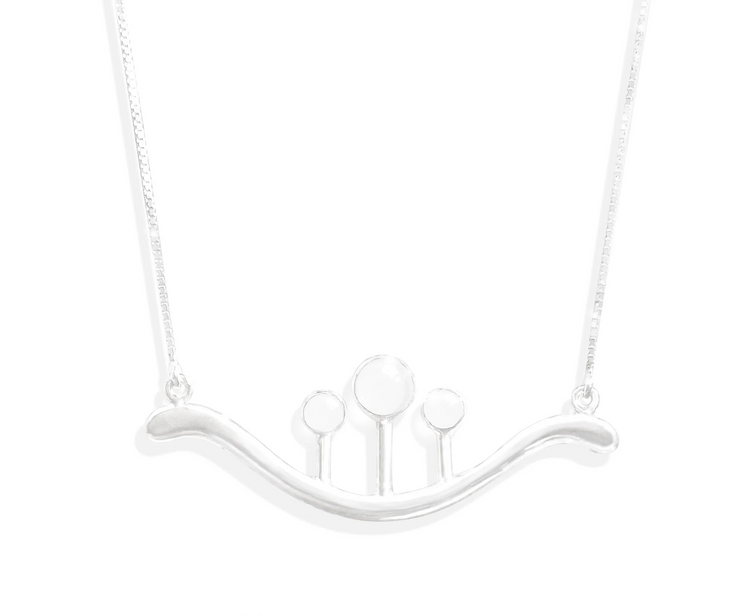 A Silver Pendant Beyond Fears on a thin square 45cm chain with crystal from Kaora Sandara Jewelry, featuring four circular shapes on a curved pendant, displayed above the "About Angels by Kaora Sandara" logo on white.