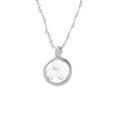 The Silver Pendant Crystal Peace by Kaora Sandara Jewelry features a silver-crystal chain and a circular pendant with three crystal sphere gemstones, symbolizing harmony within your energy field—Size S.
