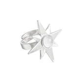 The Kaora Sandara Jewelry Silver Ring Magic Star with Crystal Sphere - Size M features a bold eight-pointed star and a central round rhinestone. Made from 925 sterling silver, the open-ended band is adjustable for a comfortable fit.