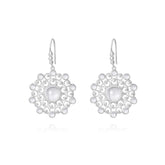 The Purity Earhooks by Kaora Sandara Jewelry are small Sterling Silver 925 dangle earrings with intricate circular lace-like designs and a central transparent crystal, shown on a white background.