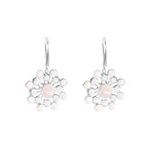 Kaora Sandara Jewelry’s Silver Earhooks Source of Love feature a circular floral design with rose quartz and crystal gemstones, each set in sterling silver bezels and suspended from elegant earhooks.