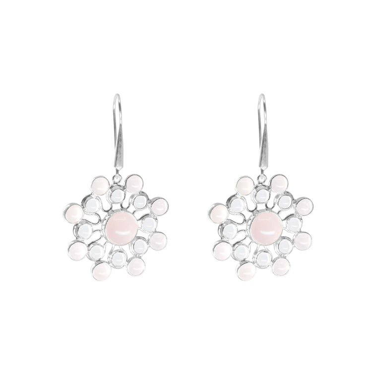 Kaora Sandara Jewelry’s Silver Earhooks Source of Love feature a circular floral design with rose quartz and crystal gemstones, each set in sterling silver bezels and suspended from elegant earhooks.