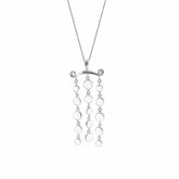 The Magic Path Pendant by Kaora Sandara Jewelry features sterling silver with crystal gemstones in three vertical rows on a sleek bar, offering minimalist elegance and crystal intuition on a fine chain.