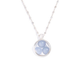 The Silver Pendant Crystal Peace by Kaora Sandara Jewelry features a sterling silver round pendant with three light blue chalcedony sphere gemstones arranged in a triangle on a silver-chalcedony chain, inspired by the chakra system. Size L.