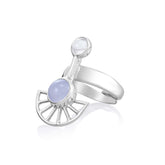 The Peace of Mind Ring by Kaora Sandara Jewelry features sterling silver, crystal, and chalcedony in a modern fan-shaped design with two round pale lavender stones. Embrace tranquility with this elegant piece. Displayed on a white background.