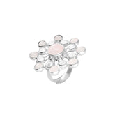 The Source of Love Ring by Kaora Sandara Jewelry features sterling silver, a central rose quartz, and sparkling crystals in a delicate floral motif—a symbol of love and elegance.