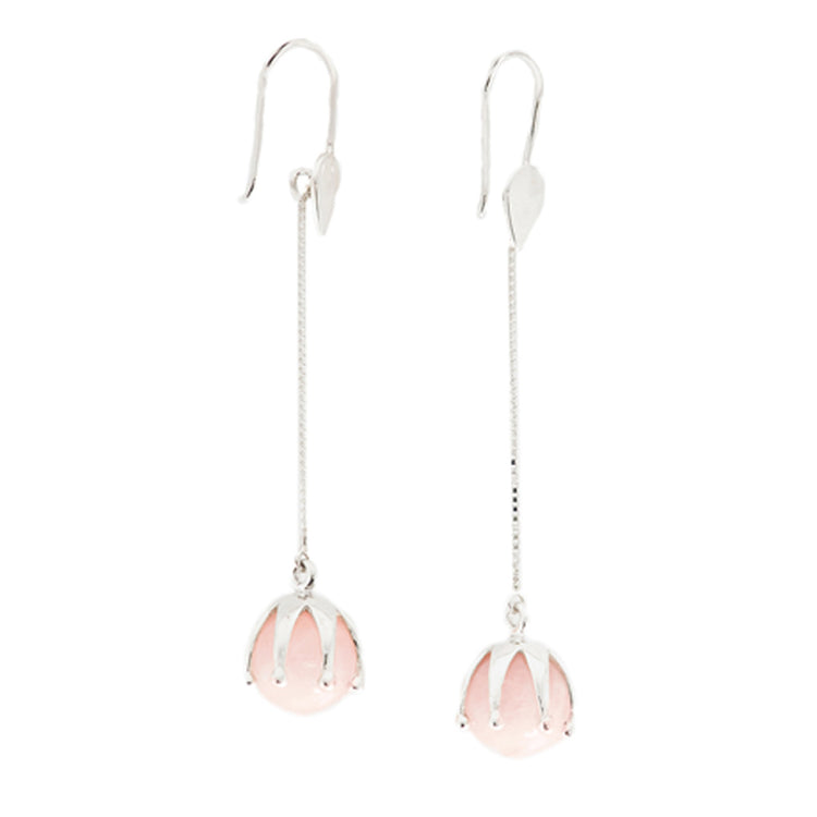 Kaora Sandara Jewelry's I'M A Queen Earhooks are sterling silver earrings with long, thin chains and round rose quartz stones in petal-shaped settings at the ends.