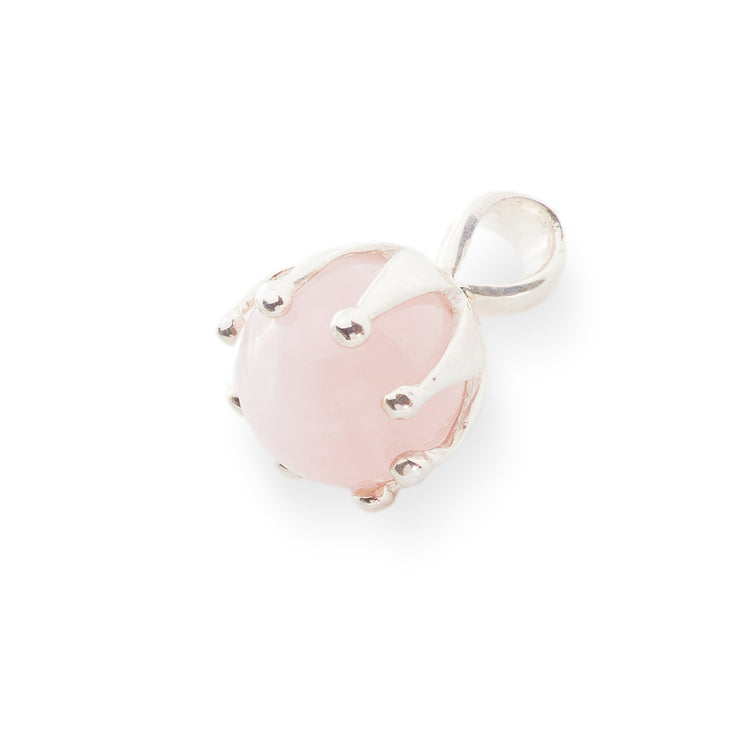 The Silver Pendant I'M A Queen Rose Quartz by Kaora Sandara Jewelry features a smooth, polished round pale pink rose quartz gemstone set in a sterling silver 925 prong setting with a loop for easy attachment to a necklace.
