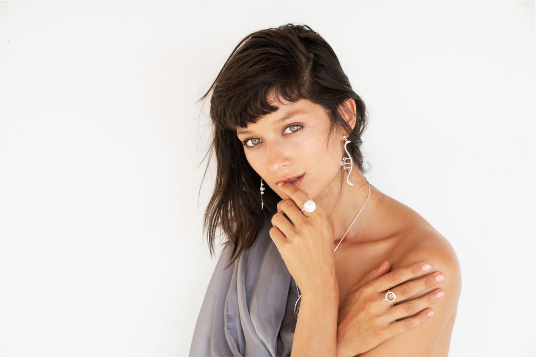 A stunning piece of Kaora Sandara jewelry, featuring a unique transformative line design.