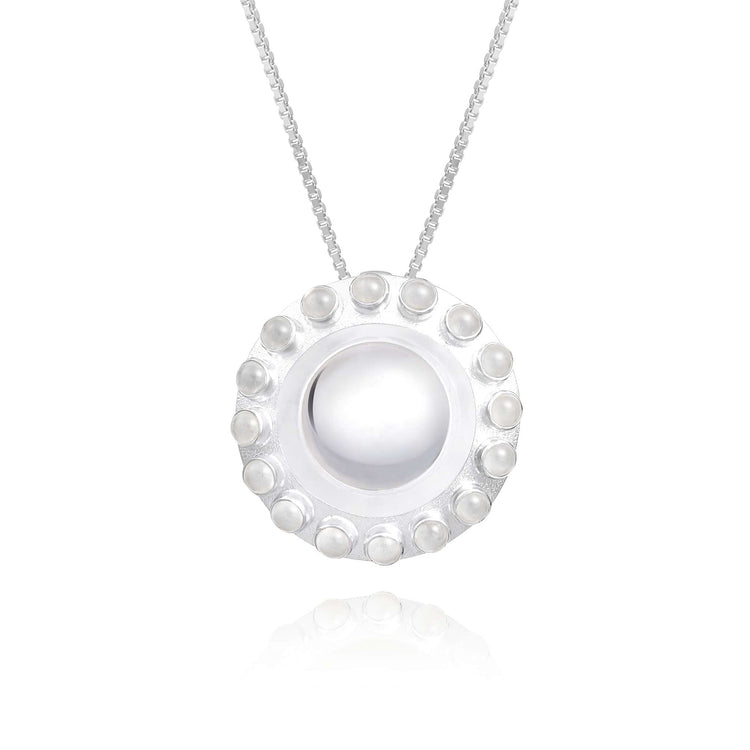 The Kaora Sandara Jewelry Silver Pendant Energy Transformer with Crystal is a sterling silver 925 necklace featuring a round pendant with a central pearl, surrounded by smaller pearls and rhinestone accents, hanging from a thin chain.