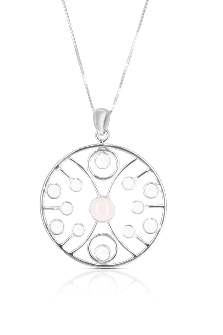 The Dissolving in Unity Pendant by Kaora Sandara Jewelry features a sterling silver wireframe with a central rose quartz and surrounding crystals, forming a circular, delicate design.