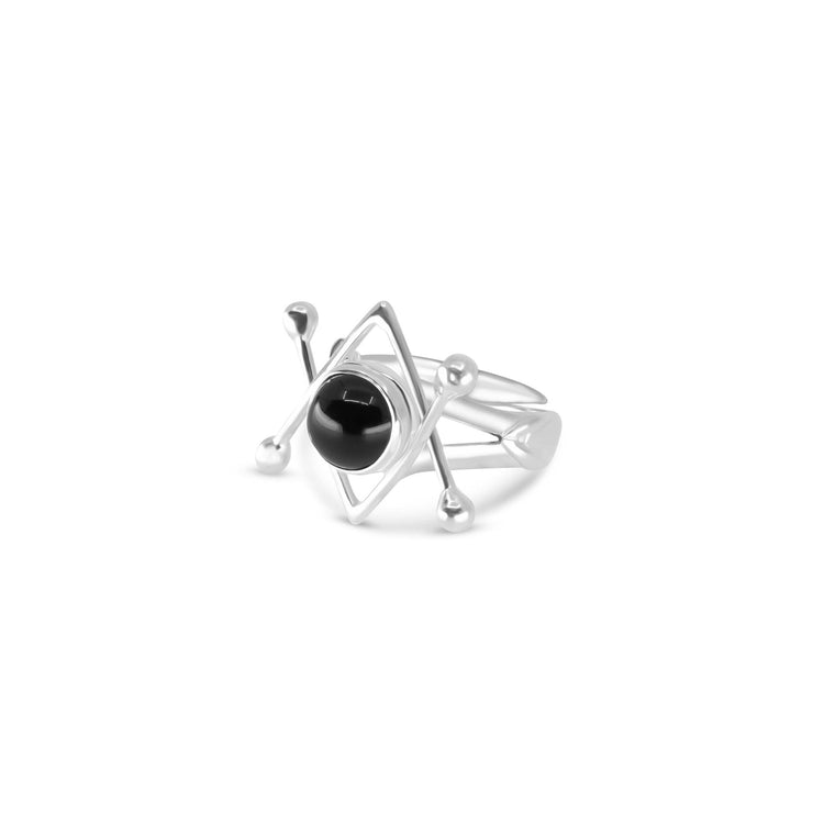 The Kaora Sandara Jewelry Energy Protection Ring features sterling silver 925 with a geometric design, intersecting lines, and a central round black agate stone for energy protection, accented by small silver balls.
