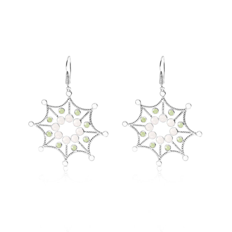 Experience the elegance of Kaora Sandara Jewelry’s Freedom from the Ego Earhooks—sterling silver dangle earrings with crystal, rose quartz, and peridot, featuring intricate wirework and secure hooks.