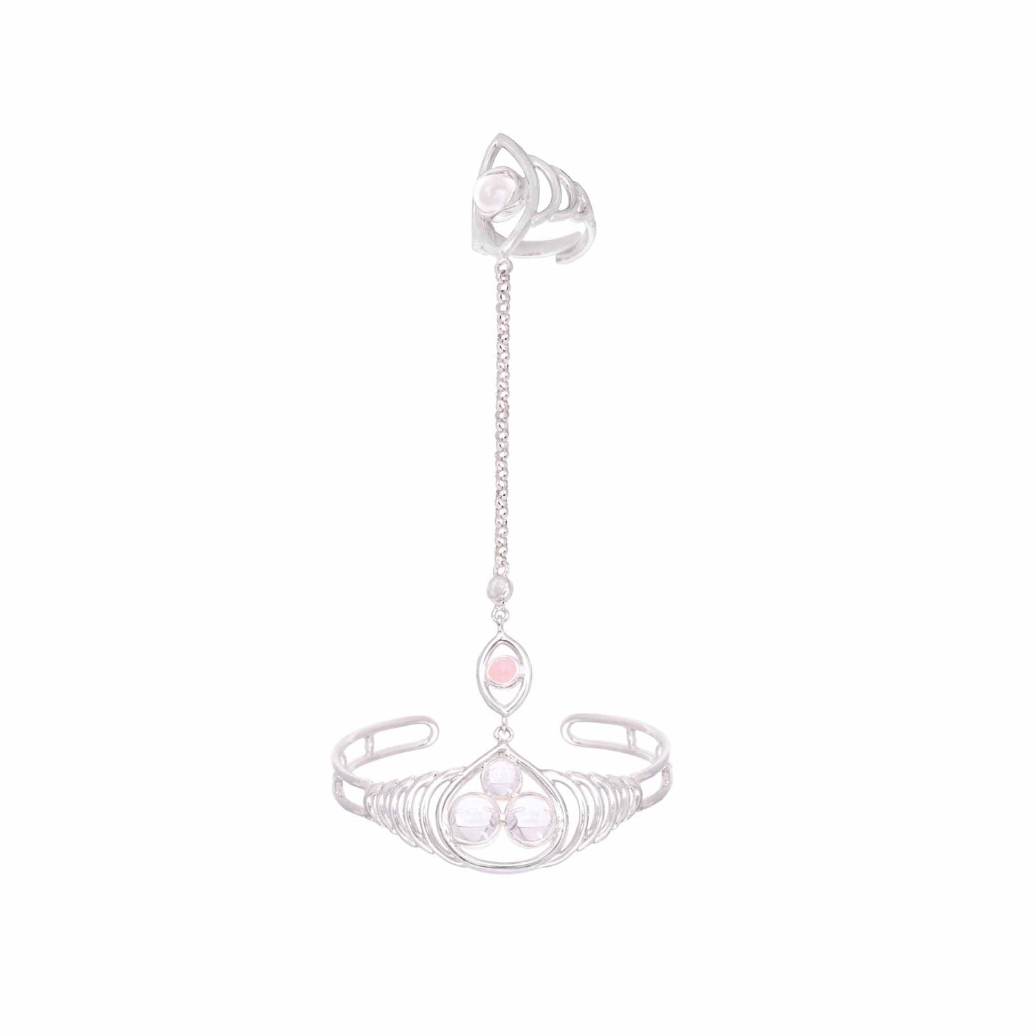 The Silver Hand Chain Transition Gift by Kaora Sandara Jewelry features a cuff bracelet and ring linked by a delicate chain, adorned with circular metalwork and crystal & rose quartz sphere gemstones, set against a white background.