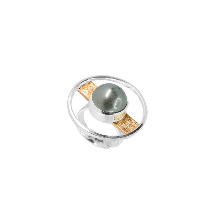 The Animus Ring by Kaora Sandara Jewelry features sterling silver with gold plating and a large pyrite stone centerpiece, set in a bold, modern design that highlights masculine style.