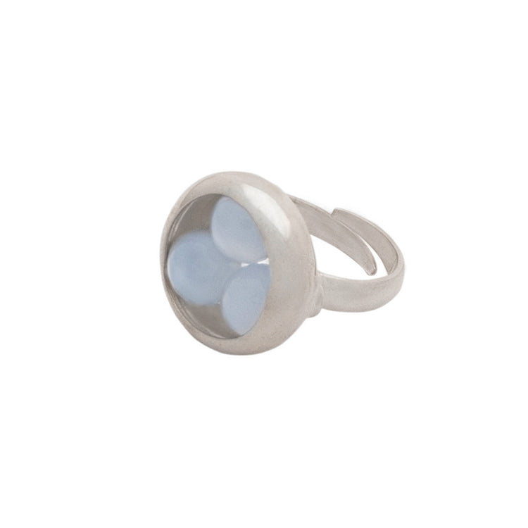 The Kaora Sandara Jewelry Silver Ring Crystal Peace with Chalcedony (Size L) features sterling silver with a clear round dome holding three pale blue chalcedony ovals in a triangular pattern.