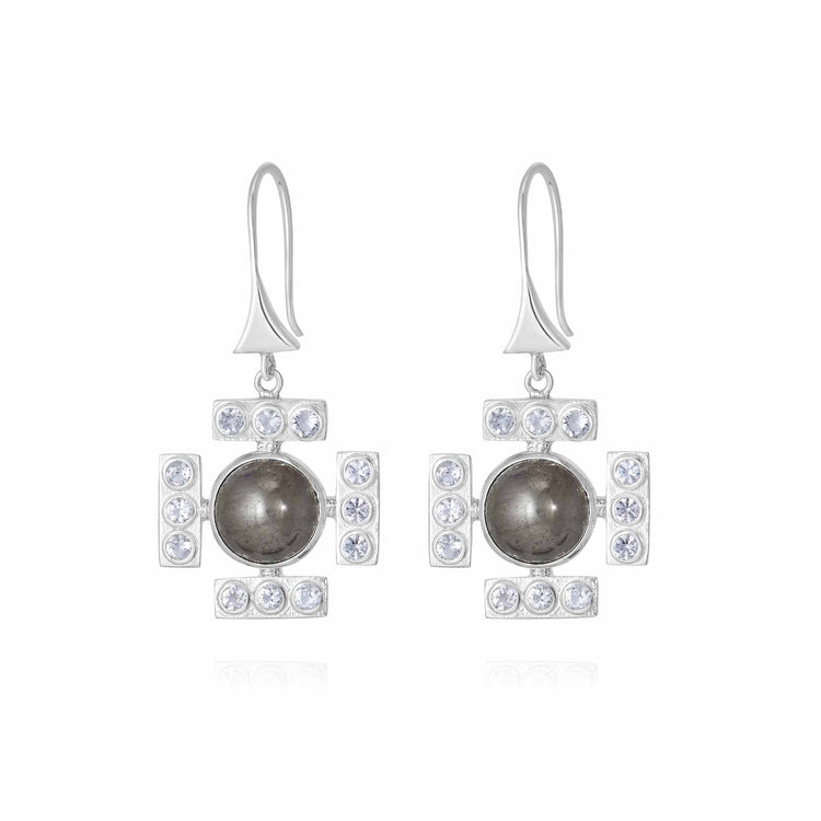 The Confidence Earhooks by Kaora Sandara Jewelry feature sterling silver with a central round dark pyrite stone, sparkling rhinestone crystal accents, and a geometric square design.