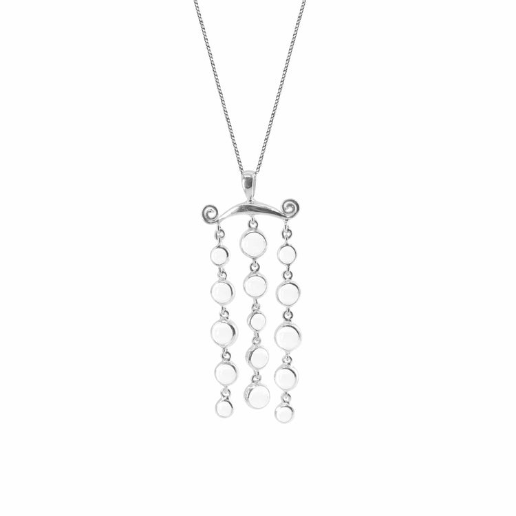 The Magic Path Pendant by Kaora Sandara Jewelry features sterling silver with crystal gemstones in three vertical rows on a sleek bar, offering minimalist elegance and crystal intuition on a fine chain.