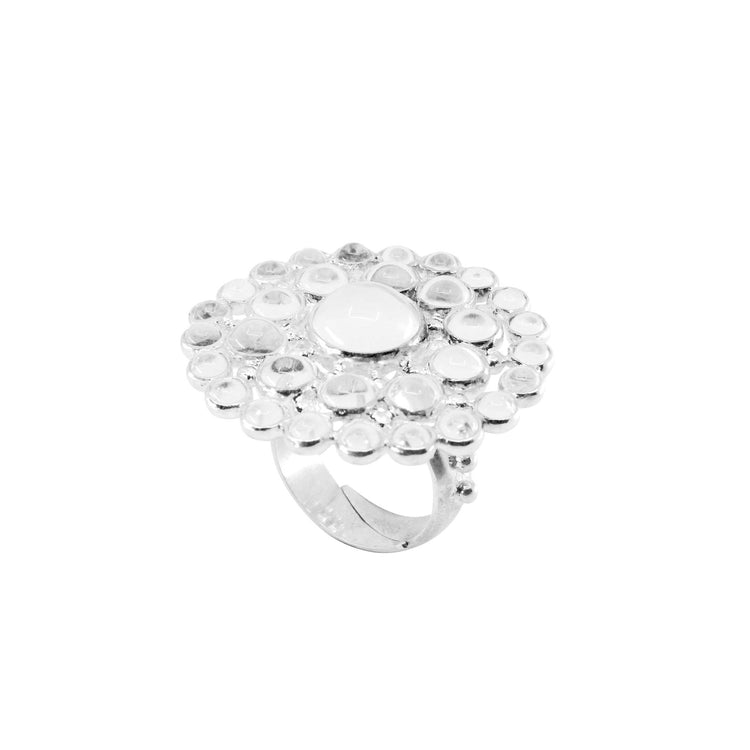 The Kaora Sandara Jewelry Purity Ring (Sterling Silver, Size L) features a large circular design with a central white crystal and smaller clear rhinestones in a striking floral or sunburst pattern.