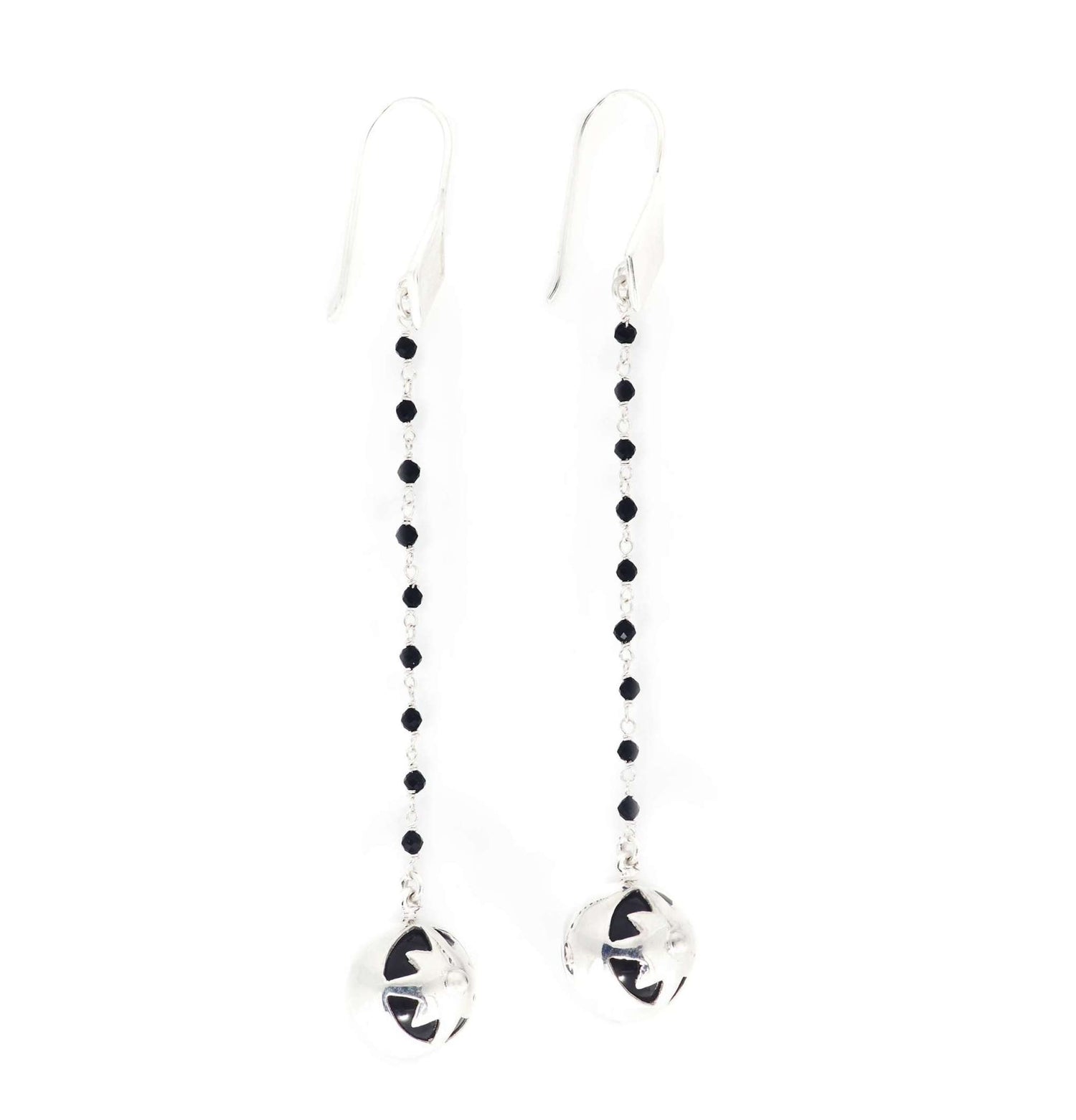 Kaora Sandara Jewelry’s Magic Time Night Earhooks are long sterling silver 925 earrings with a beaded black agate and spinel chain, finished with round silver pendants featuring cut-out star designs.
