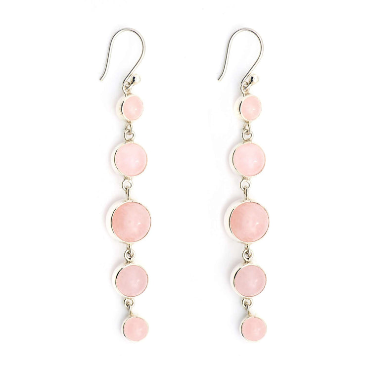 The Harmony Earhooks by Kaora Sandara Jewelry feature five round pale pink Rose Quartz gemstones set in sterling silver, arranged vertically from small to large to small, and finished with hooks for easy wear.